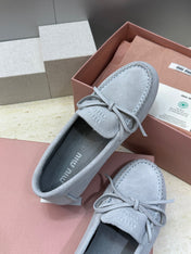 MIUMIU 26S LOAFERS IN LIGHT BLUE SUEDE WITH BOW