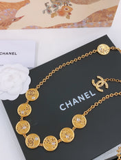 TWISTED CHAIN BELT WITH RHINESTONES AND LOGO PLATE IN GOLD TONE