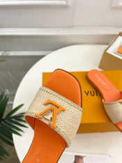 LV WOMEN CAPRI FLAT MULES IN TIGER ORANGE LEATHER AND RAFFIA