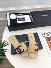 CHANEL 26S FLAT SLIDES IN BEIGE LAMBSKIN WITH BLACK CC LOGO